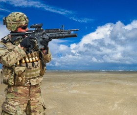 Soldiers armed with guns Stock Photo