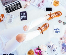Stylish young girl posing with personal stuffs Stock Photo
