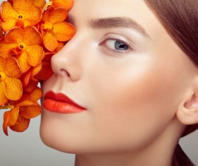 Temperament elegant girl holding orchid Stock Photo 01