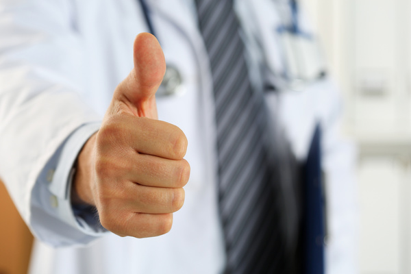 The doctor thumbs up Stock Photo