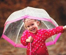 The little girl with an umbrella on rainy day Stock Photo 02