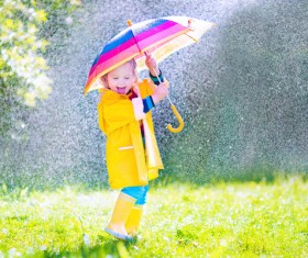 The little girl with an umbrella on rainy day Stock Photo 05