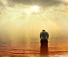 The man on the beach under the hot sun Stock Photo