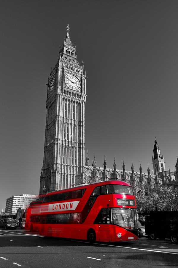 The red bus passing through Big Ben Stock Photo