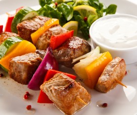 Vegetable skewers with sauce Stock Photo