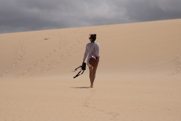 Walking girls in the desert Stock Photo