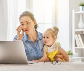 While working while taking care of the childs mother Stock Photo 04