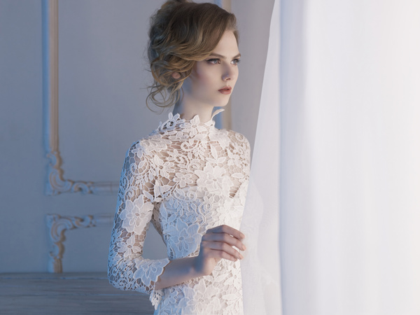 Woman in lace dress at the window Stock Photo 05
