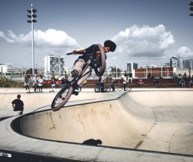 man extreme with bicycle acrobat performance Stock Photo