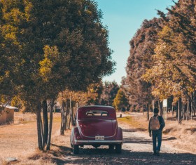 man walking pathway beautiful countryside Stock Photo