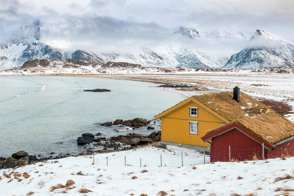 small house on the ocean shore of the winter Stock Photo