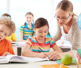 teacher who coaches students Stock Photo 01