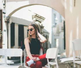woman sitting in chair resting Stock Photo