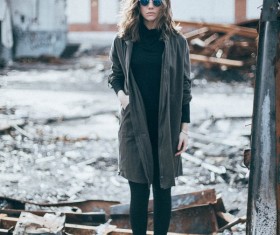 woman standing on scrap Stock Photo