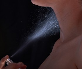 woman who sprays perfume Stock Photo 07