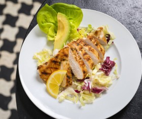 Barbecue steak with avocado lemon Stock Photo