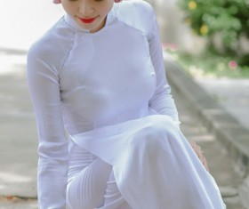 Beautiful girl in Vietnamese traditional costume Stock Photo