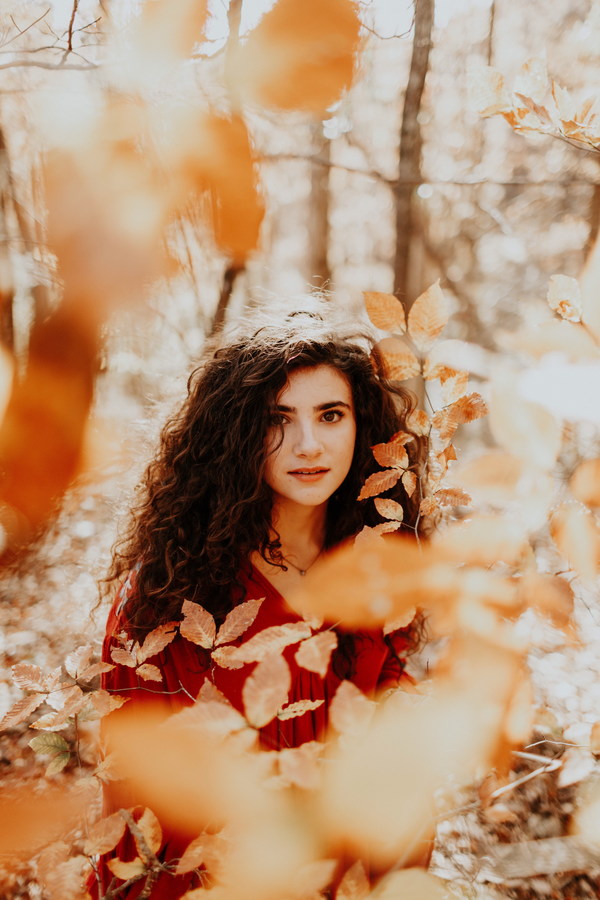 Beautiful girl in autumn outdoors Stock Photo
