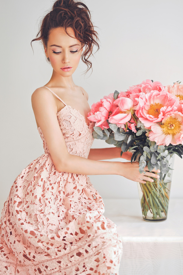 Beautiful young woman with bouquet of peony Stock Photo 01