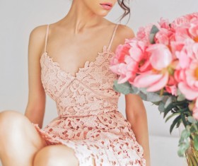 Beautiful young woman with bouquet of peony Stock Photo 03