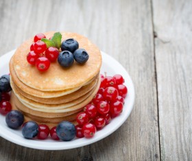 Blueberry cherry pancakes decorated Stock Photo