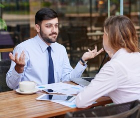 Business discussion of men and women Stock Photo 03