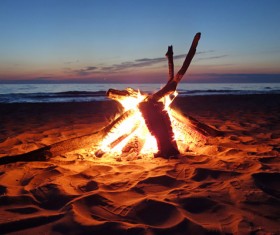 Campfire on the beach Stock Photo