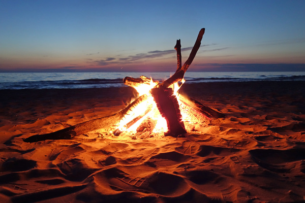 Campfire on the beach Stock Photo