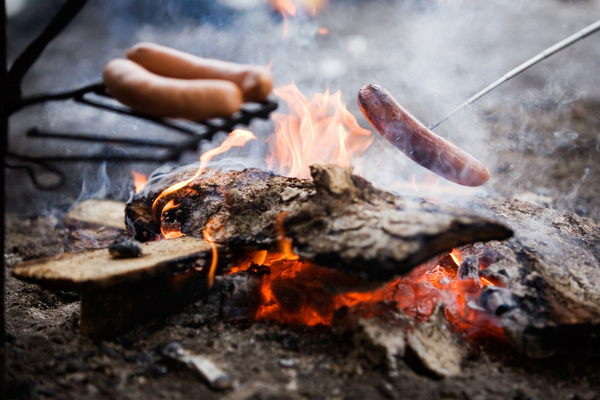 Campfire roasted sausage Stock Photo