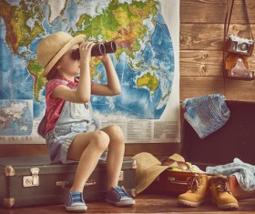 Children playing with binoculars Stock Photo