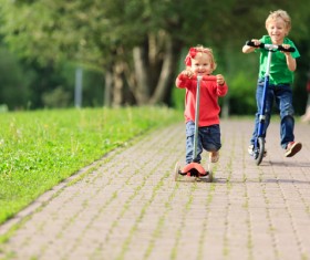 Children playing with pulleys Stock Photo