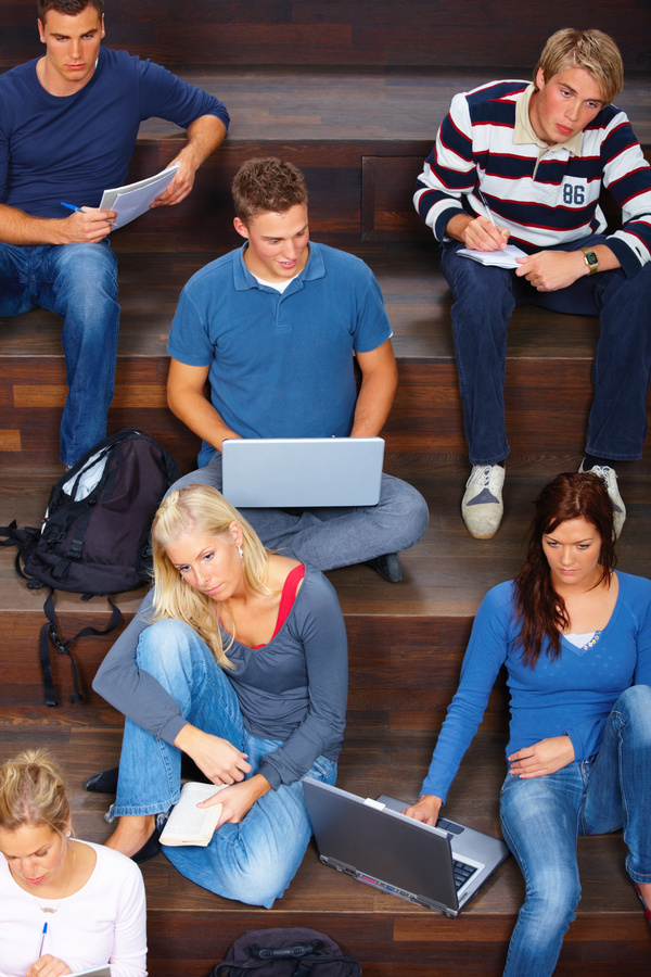 College students attending lectures Stock Photo