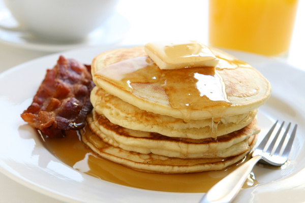Delicious homemade honey pancakes Stock Photo