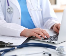 Doctor using tablet Stock Photo