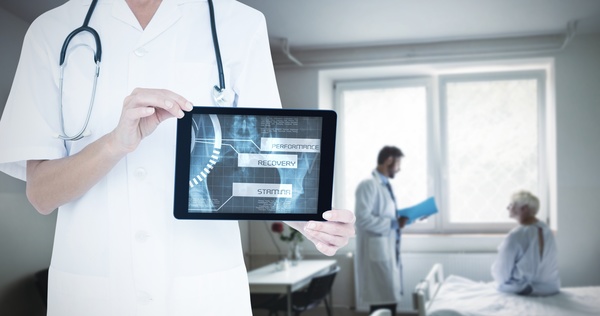 Doctor working with tablet in hands Stock Photo 03