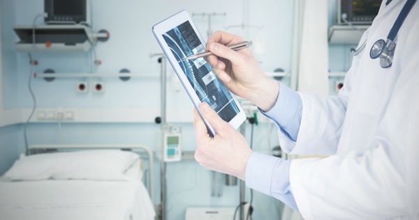 Doctor working with tablet in hands Stock Photo 06