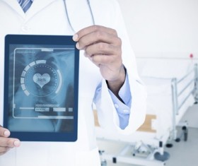 Doctor working with tablet in hands Stock Photo 08