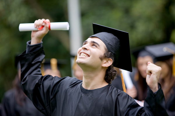 Excited graduates Stock Photo