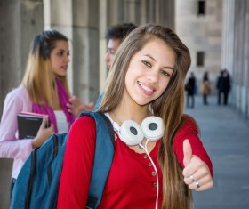 Female college student thumbs up Stock Photo