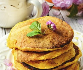 Floral decorated pancakes Stock Photo