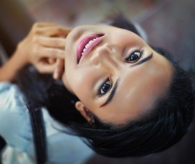Girl looking up smiling Stock Photo