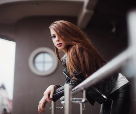Girl standing on the terrace Stock Photo