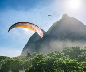 Gliding umbrella in the sky Stock Photo 02