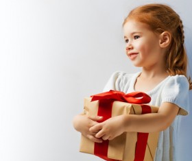 Holding a gift box happy little girl Stock Photo 02