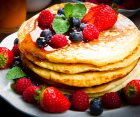 Honey delicious fruit pancakes Stock Photo