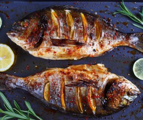 Lemon roasted fish Stock Photo