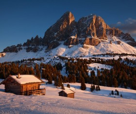 Lonely cottage with outdoor snow scene Stock Photo