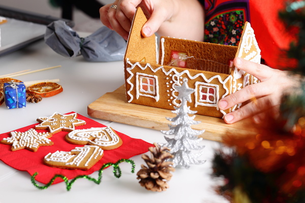 Making Christmas cookie house Stock Photo 01