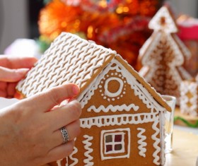 Making Christmas cookie house Stock Photo 02