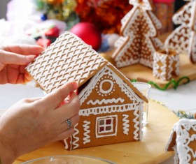 Making Christmas cookie house Stock Photo 03